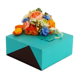Indonesia – Beautiful Orange And Blue Flowers With Cake