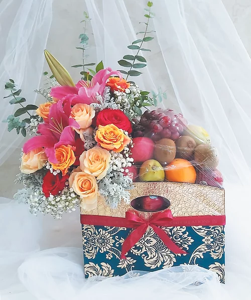 Bright Red and Orange Flowers in Fruits Basket