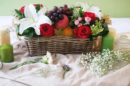 Red Roses and White Lilies in Fruits Basket