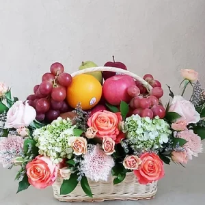 Orange And White Flowers In Fruits Basket