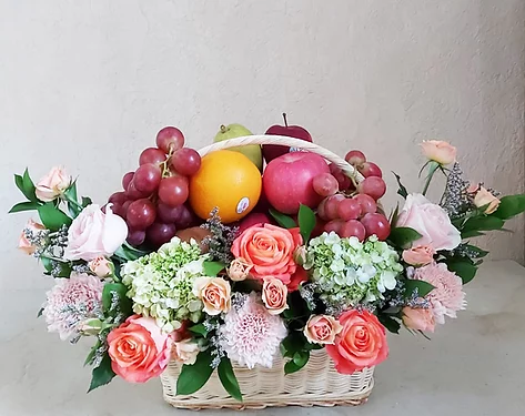 Orange and White Flowers in Fruits Basket
