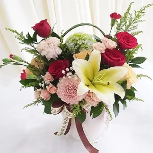 Colorful Flower Arrangement With White Vase