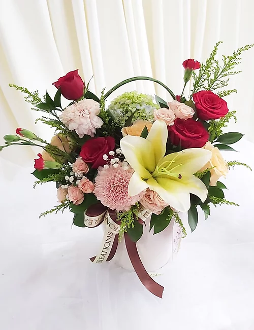 Colorful Flower Arrangement with White Vase